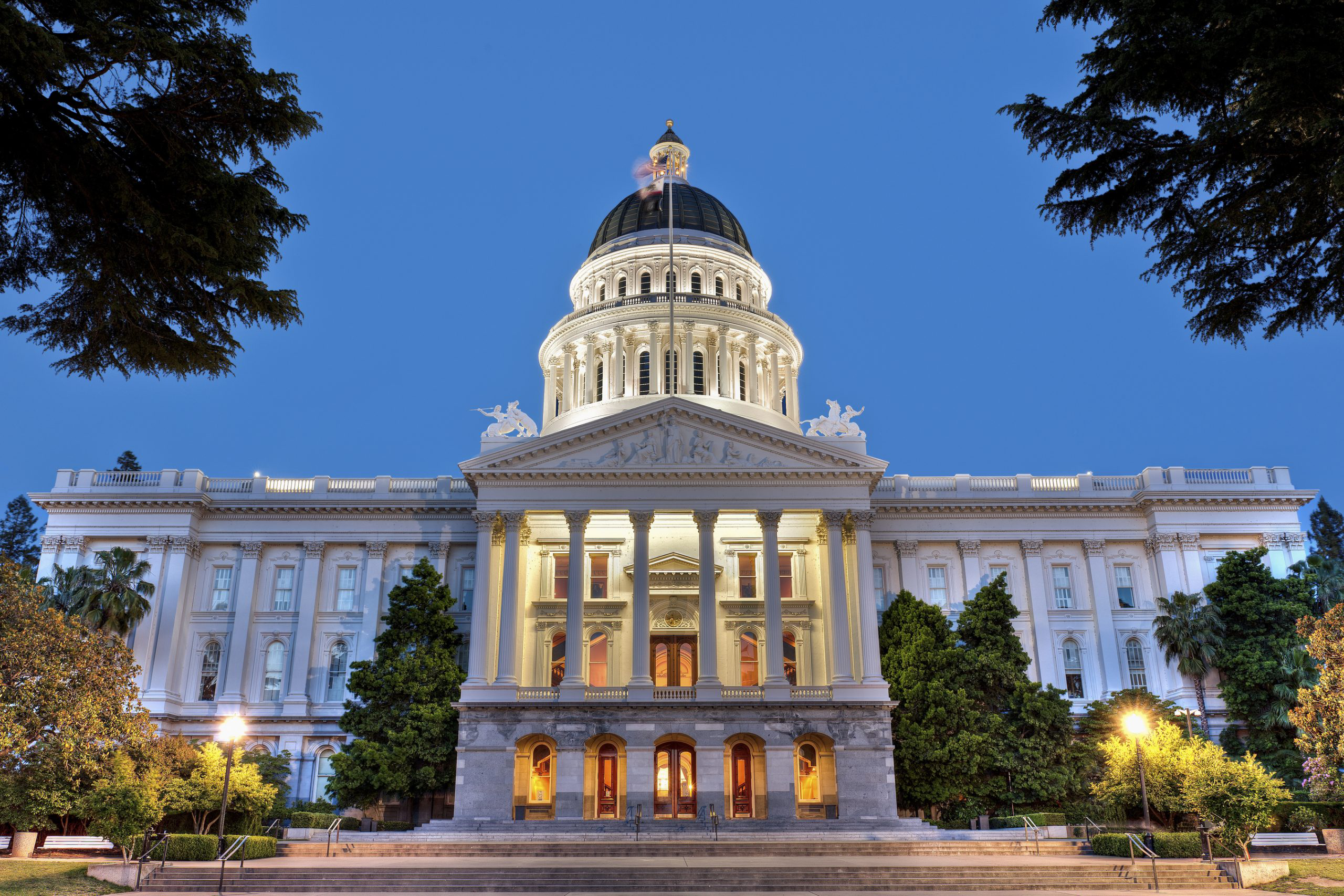the front of the California State Capitol at dusk